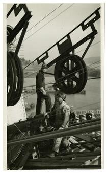 Golden Gate Bridge construction workers spinning cable