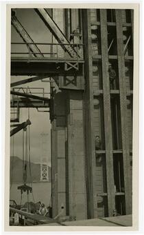Golden Gate Bridge construction workers on south tower with view of north tower
