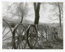 Railings constructed from wagon wheels
