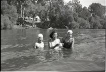 Three women at the river