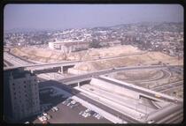 North and south lanes and overpasses of the Hollywood Freeway, looking northeast of downtown Los Angeles