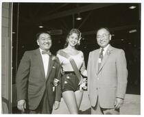 Minoru Shinoda, Miss San Leandro, and Sam Sakai, opening day of the San Francisco Flower Terminal