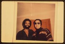 Jim Jones with Huey Newton