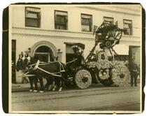 Horse drawn fire engine decorated with flowers, Los Angeles