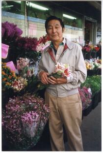 Person holding flowers