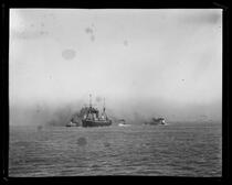 Steamship transporting troops to Philippines, flanked by smaller vessels, San Francisco Bay