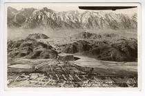 Photographic postcard showing site of Manzanar Incarceration Camp