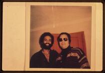 Jim Jones with Huey Newton