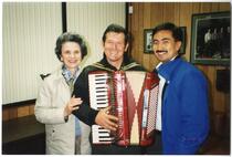 Three people (with accordion)