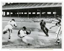 Johnny Moore of the Los Angeles Angels, sliding into third base
