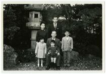 Doc Yatabe (standing) and family