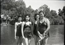 Four women at the river