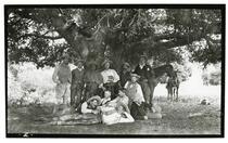 Group portrait of men under a tree, Rancho Santa Anita