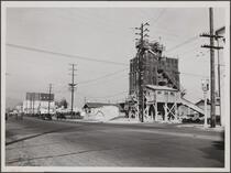 Looking north on La Brea Avenue (rock crusher on corner) from south of Romaine Street, Hollywood
