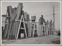 Lumber storage at southeast corner of Broadway and Jefferson Boulevard