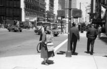 Woman with religious signs on Market Street at New Montgomery