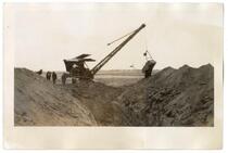Digging a pit for the animals' corpses, circa 1924  